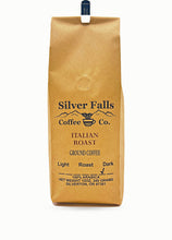 Load image into Gallery viewer, A brown kraft paper bag of Silver Falls Coffee Co. Italian Roast Ground Coffee, shown against a plain white background.